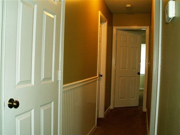 Hallway to 2 BR, 2 BA, Sep Laundry Room