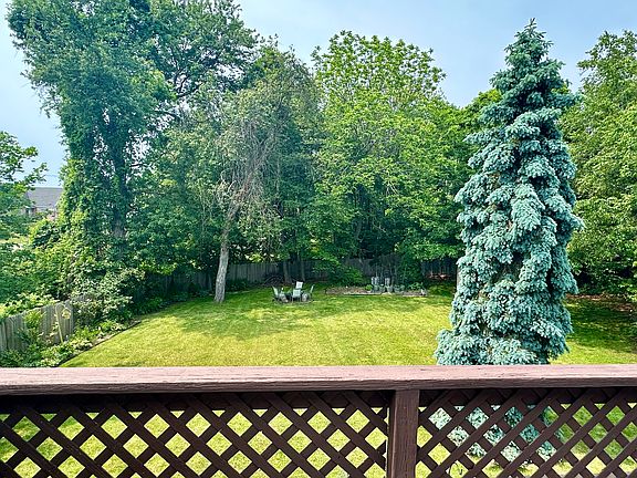 Fenced backyard from porch view