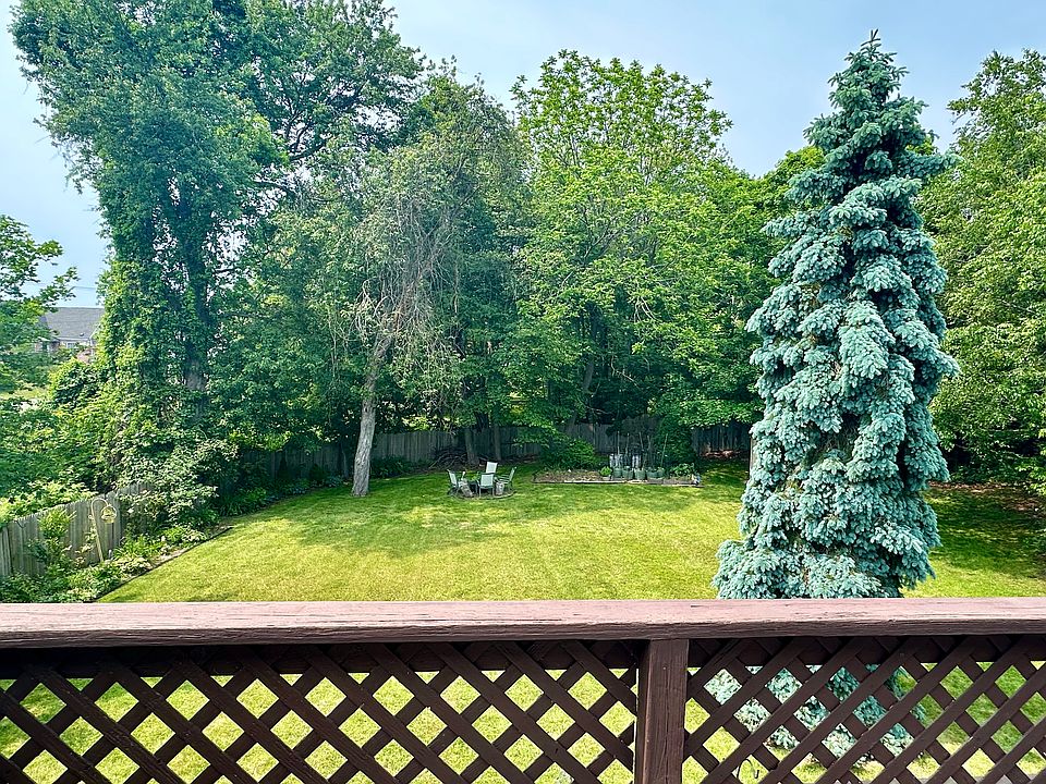 Fenced backyard from porch view