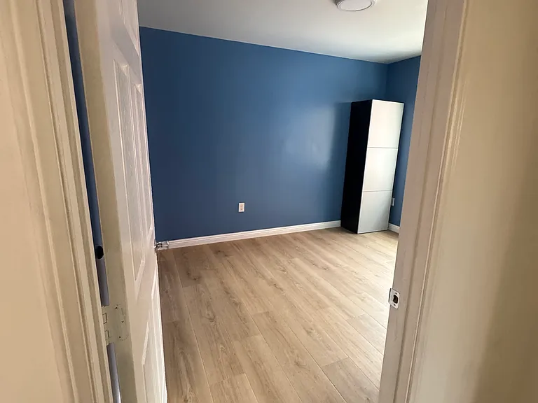 Bedroom 1 on the left of the hallway from the prior photo.