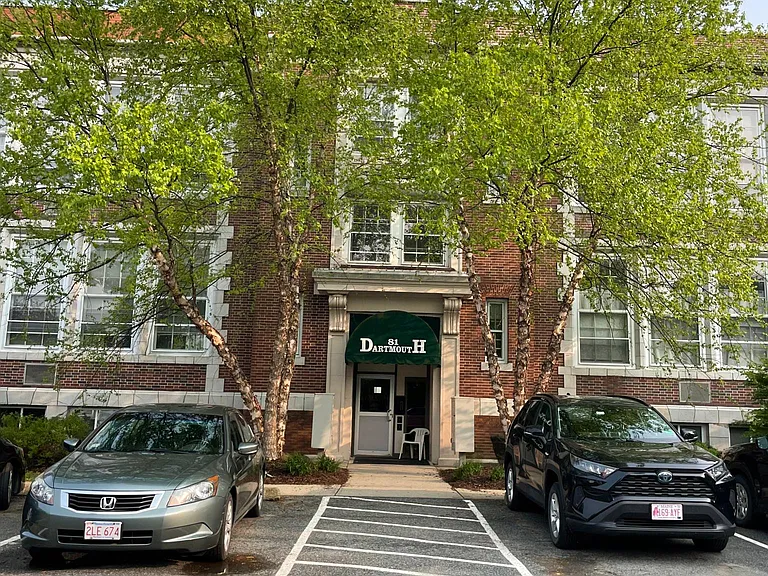 Main entrance & large off street parking lot.