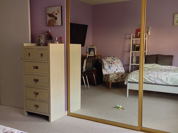 Bedroom with large closets