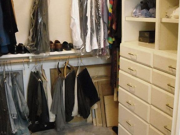 Walk-in Closet w/ Built in Drawers