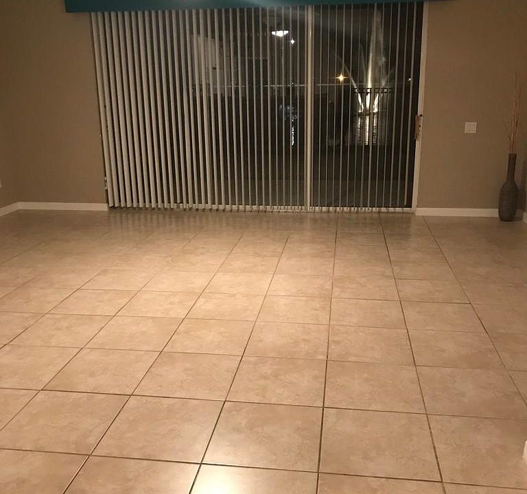 Living/family room with screened patio on a pond view