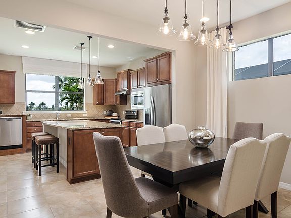 Model Representation Open cafe dining space right off kitchen