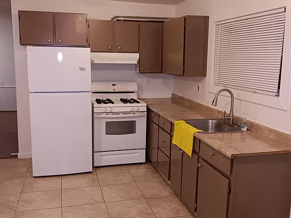 Fridger, stove, countertop and cabinets, etc.