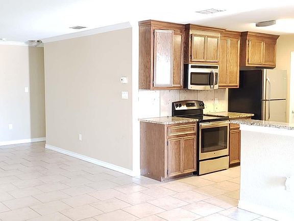 4th image of 15421 Palmira Ave APT A