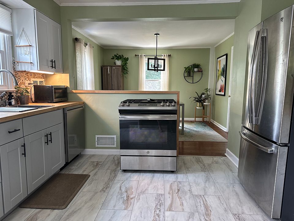 Large Kitchen with Counter Open to Dining Room