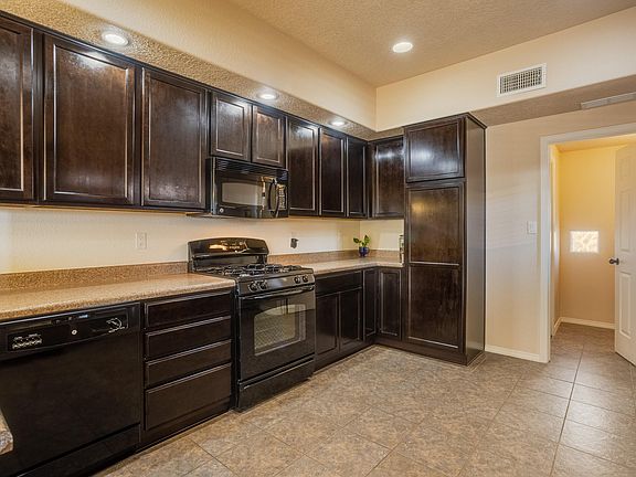 5th image of 11009 Esmeralda Dr NW
