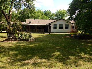 View of the back of the house from the barn.
