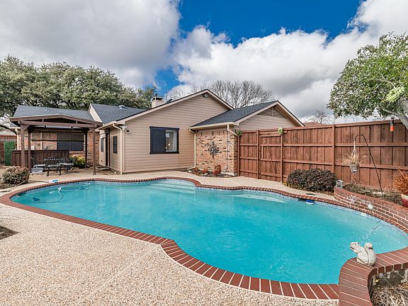 Family friendly swimming pool in private backyard