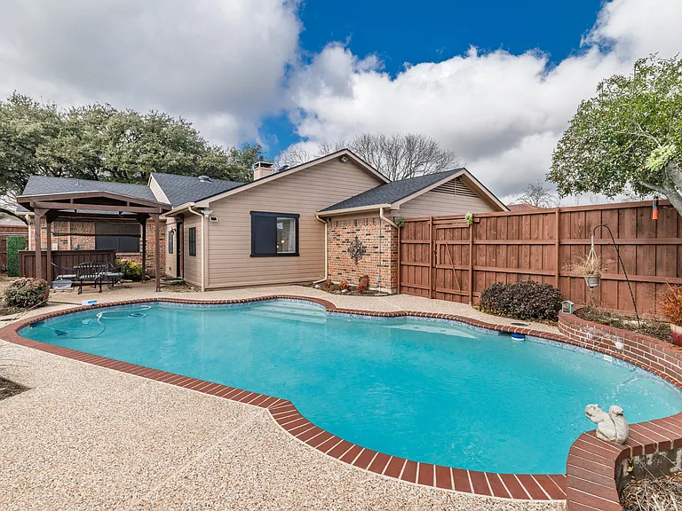 Family friendly swimming pool in private backyard