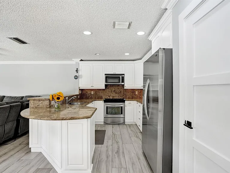 4142 NW 58th Dr — Photo 19