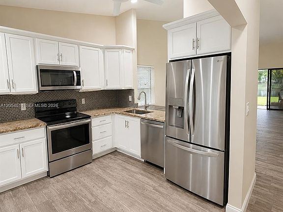 4th image of 3899 Carambola Cir N #29126