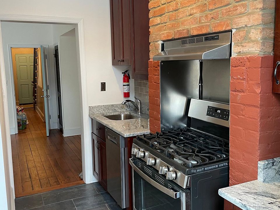 All stainless Steel Appliances. Gas range stove, hood, dishwasher and refrigerator.