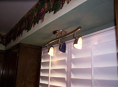 Upgraded Window Coverings and Lighting