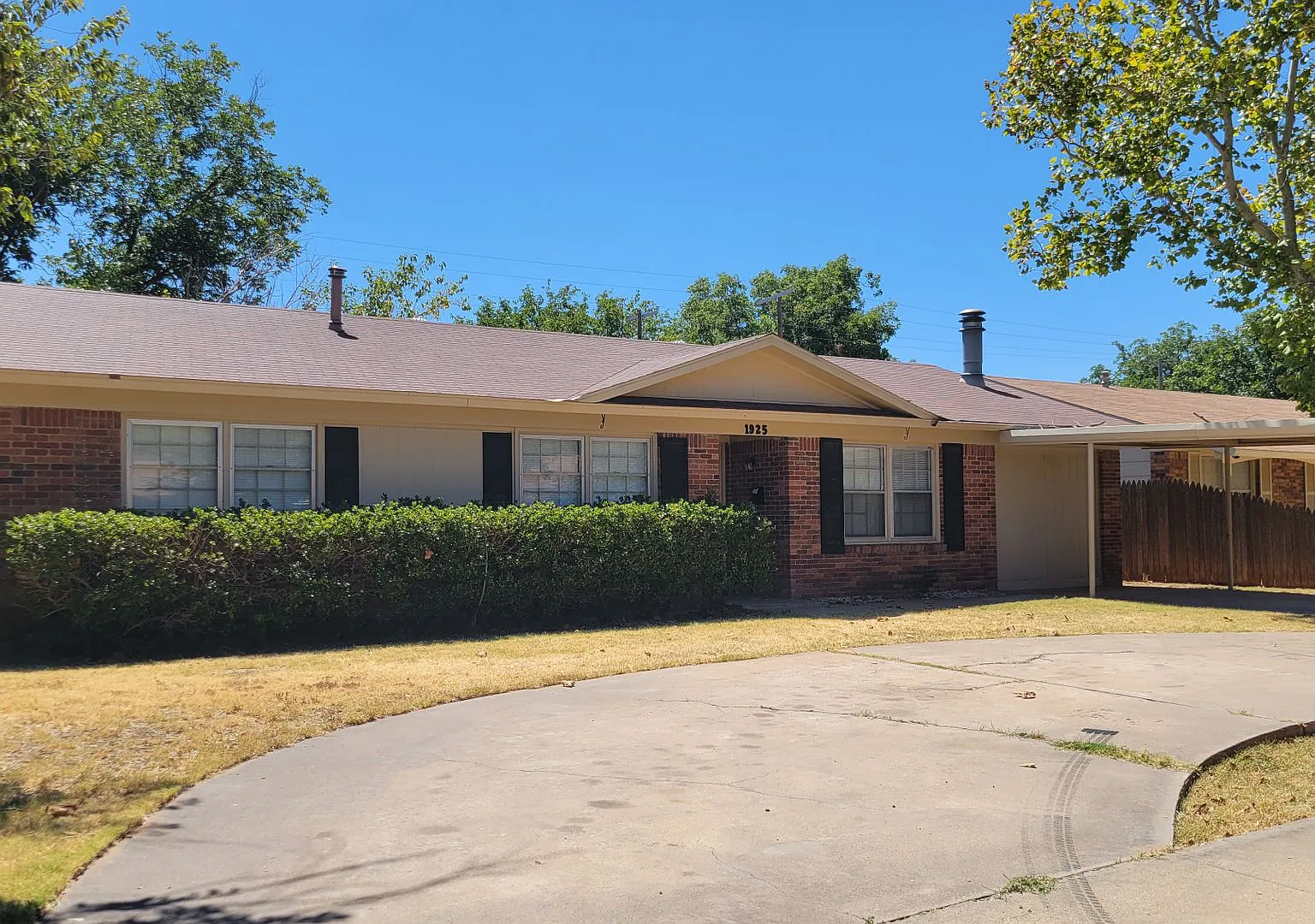 Updated 3-Bedroom Home with Carport and Storage Building — Photo 3