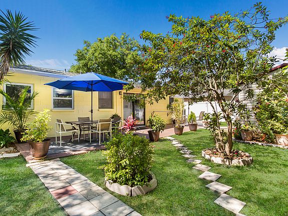 Fenced tropical backyard