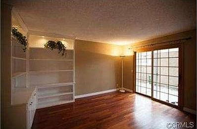 Dining room with built in shelves - access to patio area