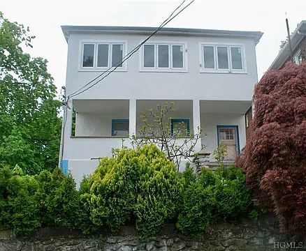 Beautiful 3-family home on a quiet street close to Main Street .NO THRU-TRAFFIC ON THIS STREET