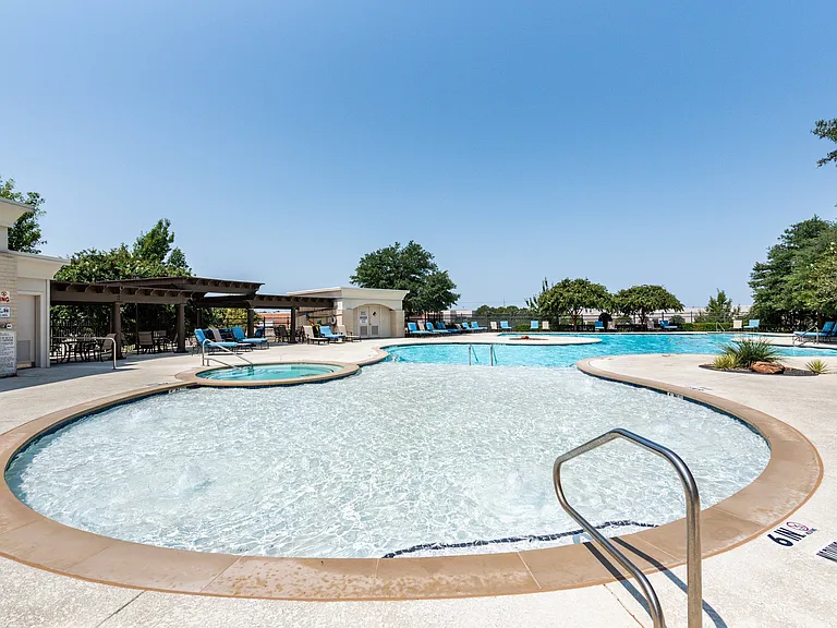 Resort style pool with sun shelf