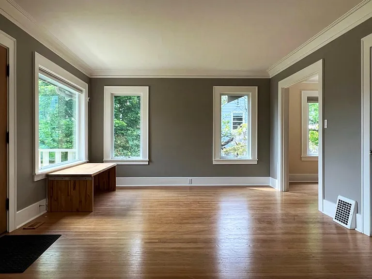 living room features extra large windows