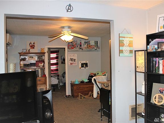 a look back from the dining area are your 2 bedrooms, second bedroom is tucked back off the living area. This would make a great rental or downsize.