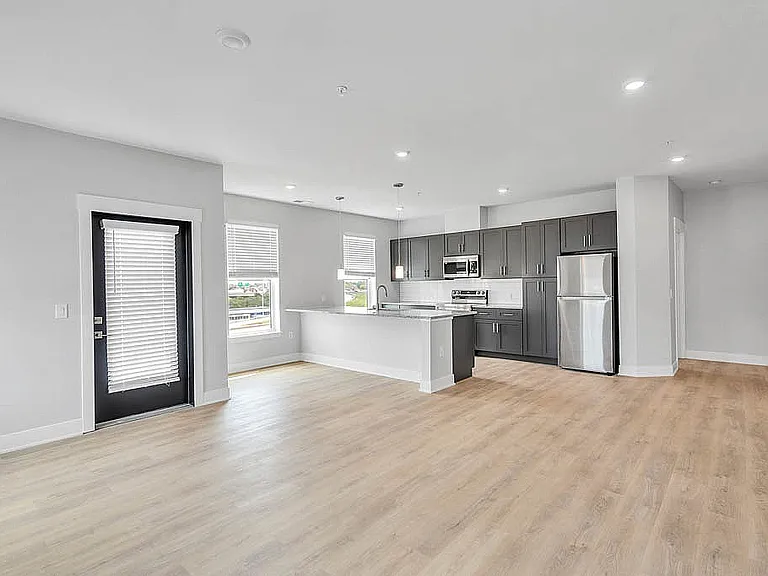 Bright & Open Concept Kitchen & Living Area