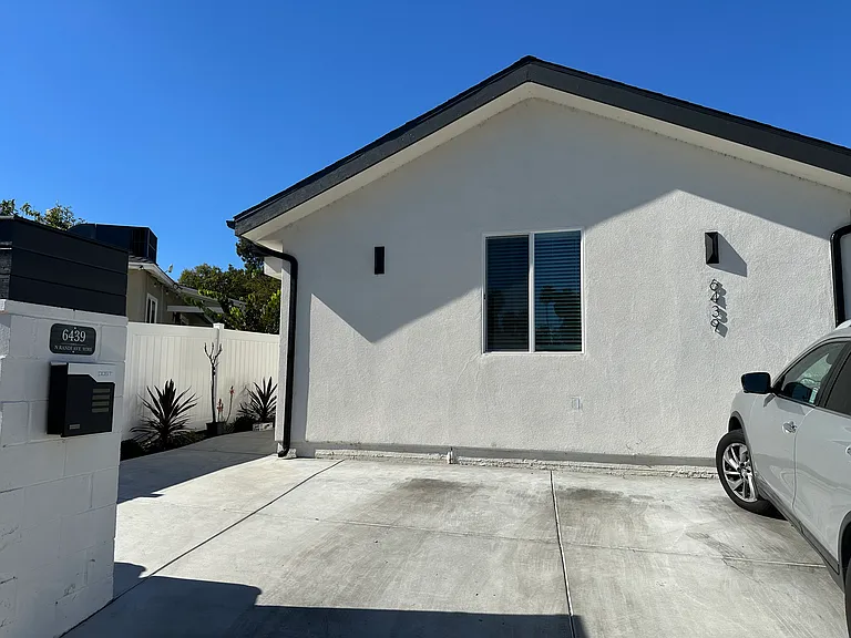 2 parking Spaces and Universal Electric Tesla Car Charger