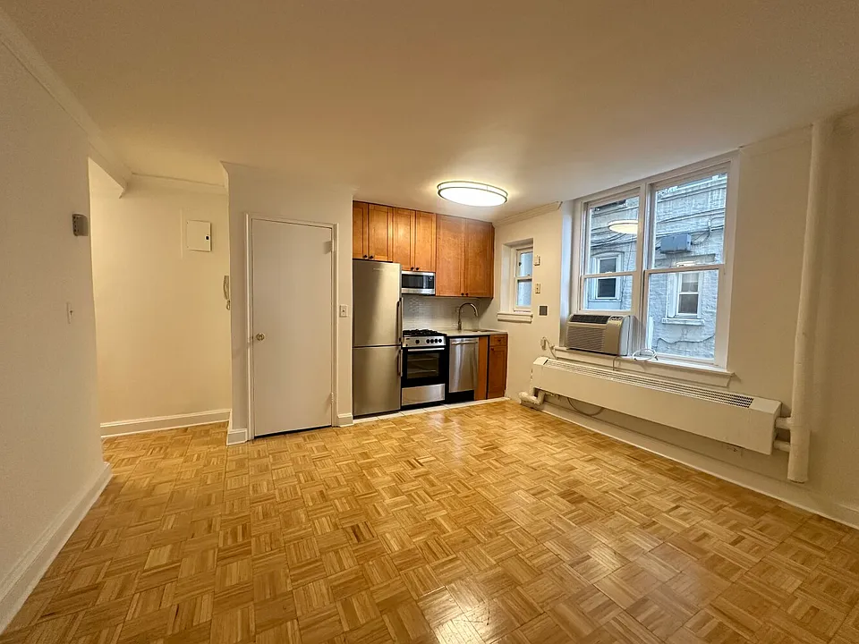 209 E 66th St #102