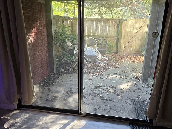 door to the outside patio / backyard