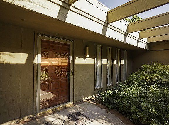 Glass storm door on front entry