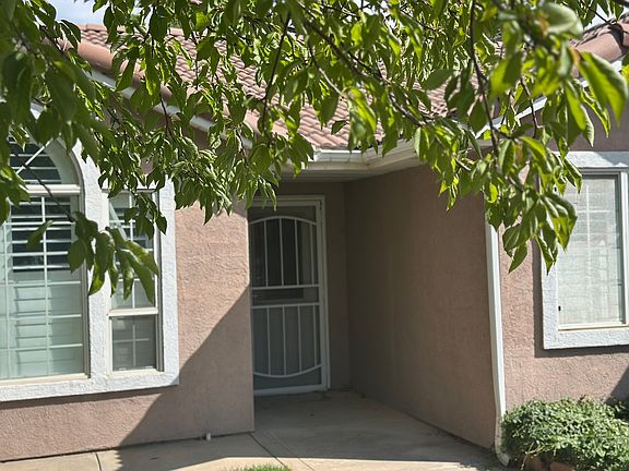 Close up of front door showing steel screen security door