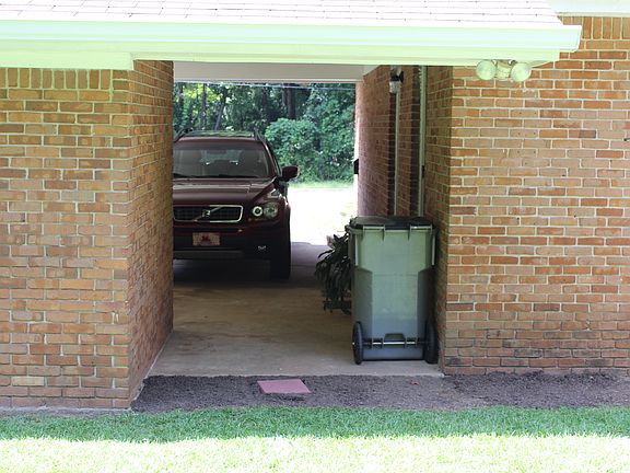 carport opening to backyard