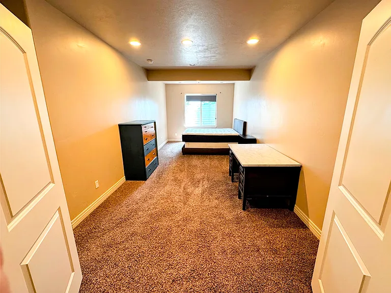 View of master bedroom from the closet.