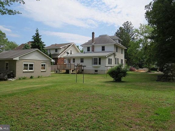 Beautiful yard with deck and outdoor fireplace