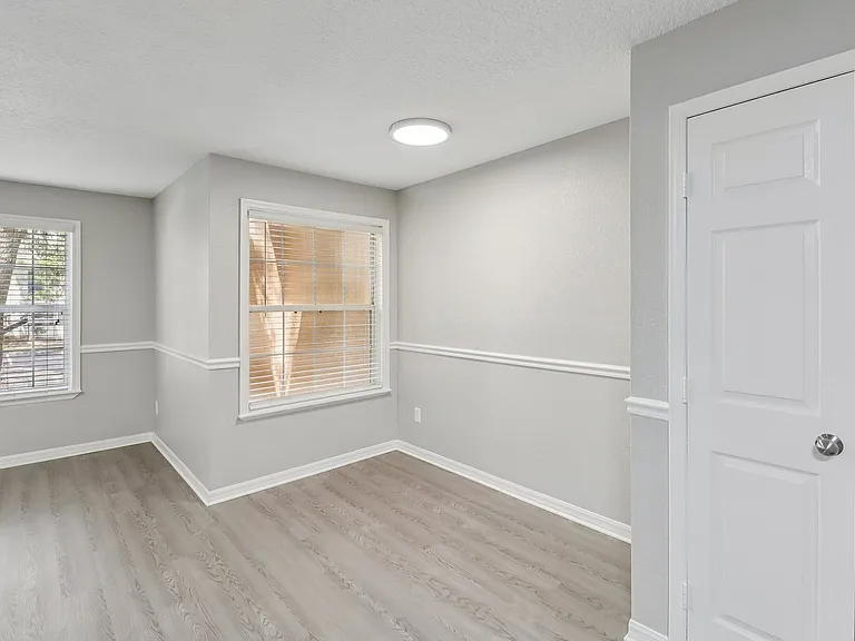 Bright dining space with natural light and clean finishes