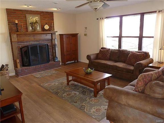 High end wood laminate flooring in family room.