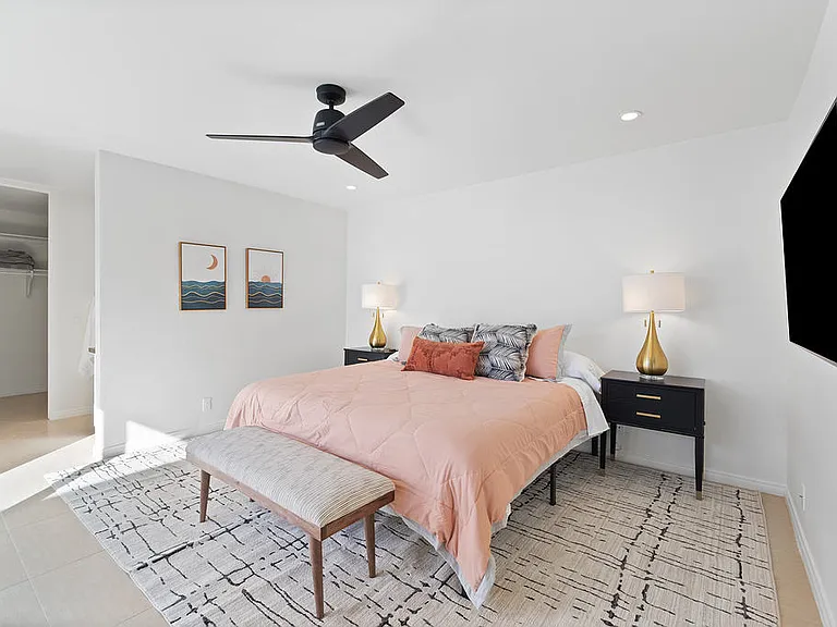 GUEST BEDROOM SUITE HAS COURTYARD ACCESS, SHOWER OVER TUB