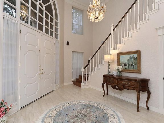 SOARING DRAMATIC 2 STORY ENTRY WITH MARBLE FLOORS