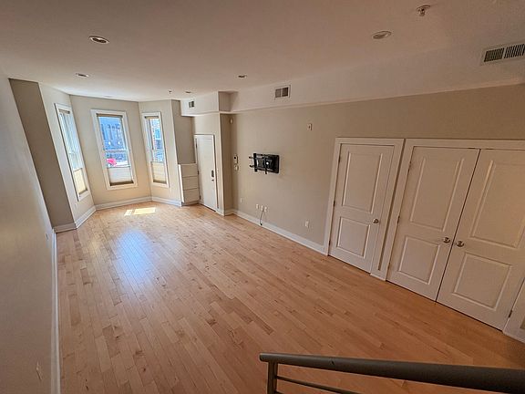 Open living room with tons of natural light.