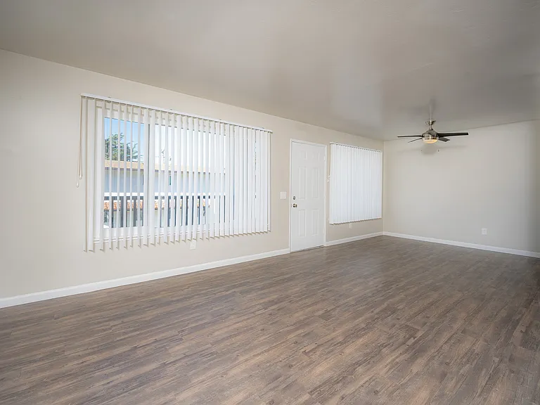 Experience the airy and bright ambiance of this contemporary apartment living room.