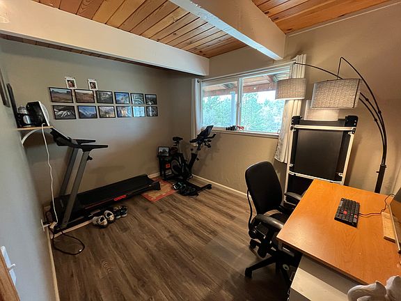 bedroom on ground floor; currently used as an office and workout room, but could be set up with a twin or queen bed