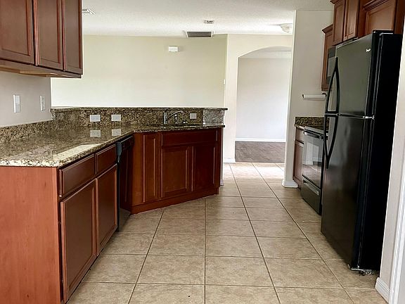 Eat In Kitchen features granite, pantry and breakfast bar