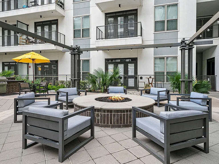 Enjoy our outdoor firepit amongst other poolside amenities