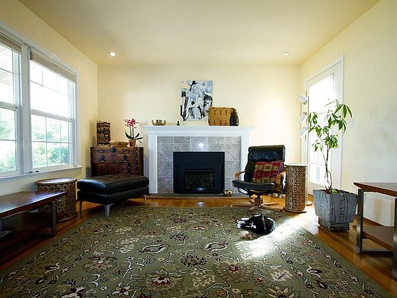 LR with gas fireplace and access to patio