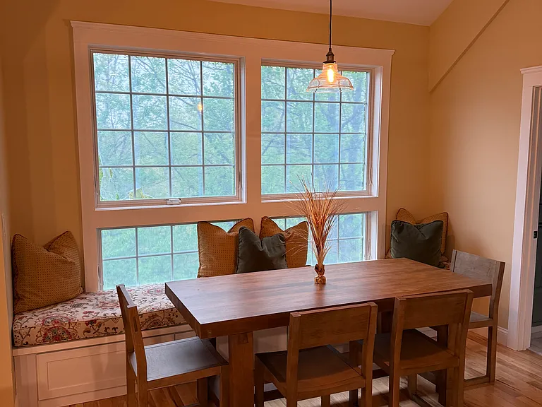 Dining area. With bench seating and table for six with views