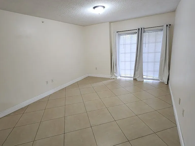 5011 Wiles Rd #207 — Photo 5