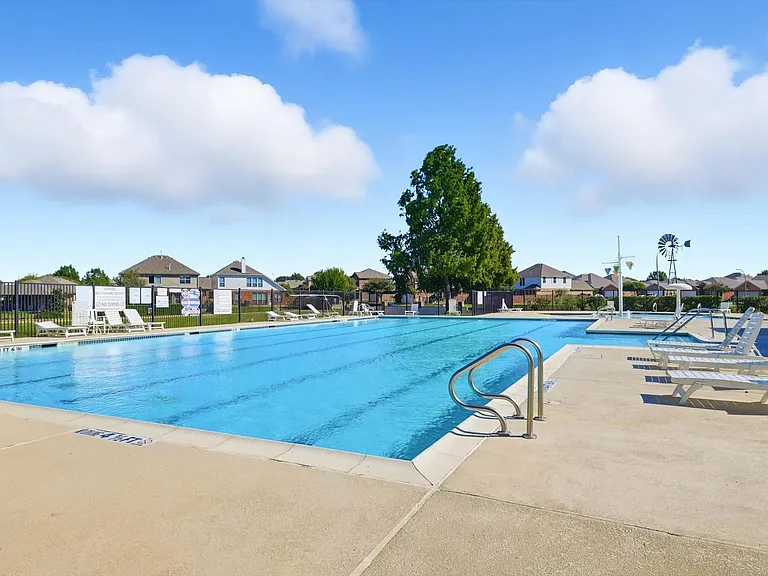 And the view of the community pool just across the water. This is like vacation living