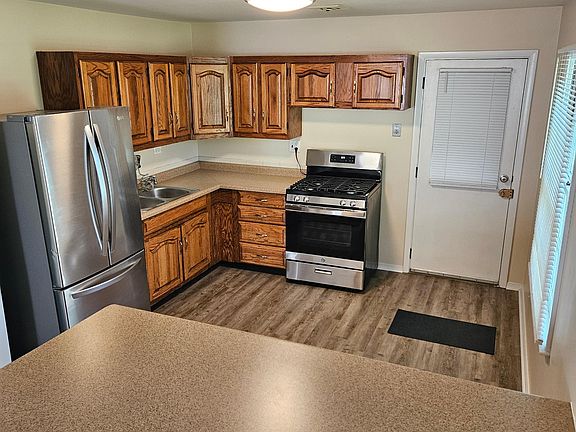 New vinyl plank flooring in kitchen, bath, and laundry.
New stainless oven/stove.